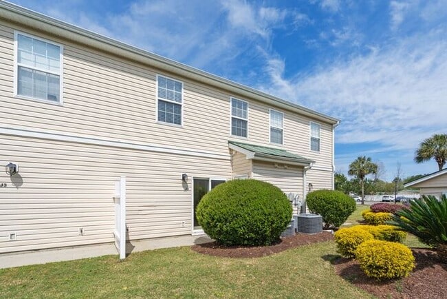 Building Photo - Where your commute is shorter than the Starbucks drive-thru line on 501. Grab the keys before som...