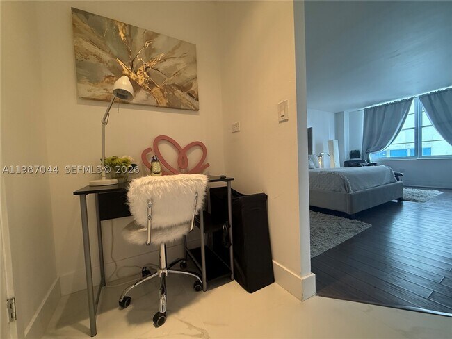 Building Photo - 5555 Collins Ave