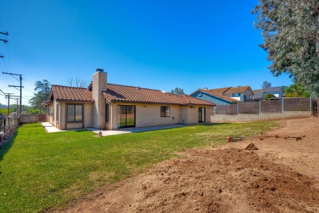 Building Photo - Corner Lot 4BR with Vaulted Ceilings & Big Yard