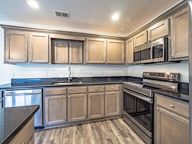 Building Photo - Available now! Has solar panels!