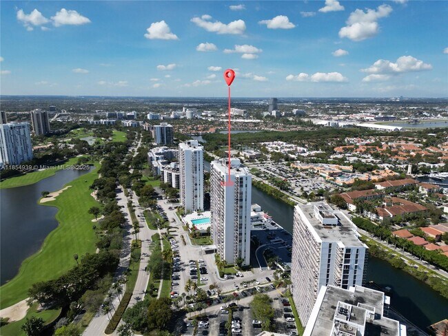 Building Photo - 3675 N Country Club Dr