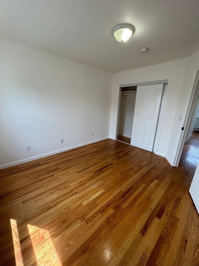 Building Photo - Discover Your Dream Home in Neptune: Spacious 4-Bedroom, 2.5-Bath with Private Backyard and Drive...