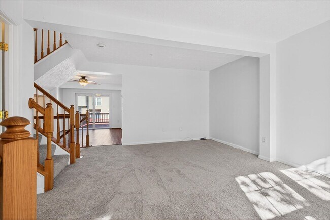 Building Photo - 3BR Townhome in Russett | 3 Levels | Walkout Basement + Deck | $2,400/mo** Beautiful 3-level town...