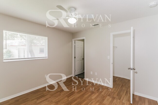 Building Photo - This charming home is ready for your personal touch!