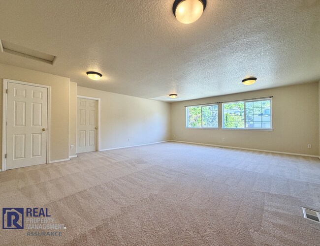 Building Photo - Spacious 4BR/2.5BA Beaverton Home with 3-Car Garage and Covered Deck