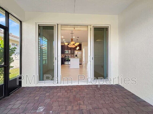 Building Photo - 9870 SW Trumpet Tree Cir