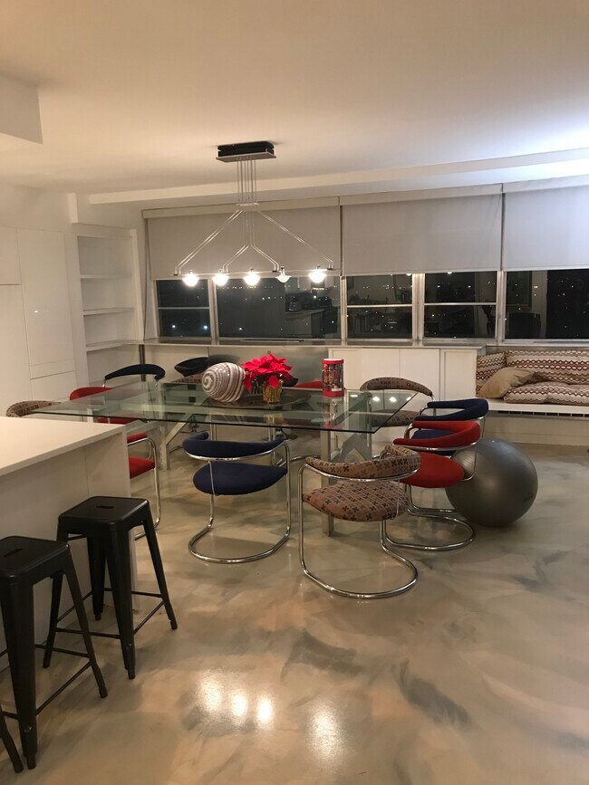 open floor plan with walls of built ins. - 1620 E Broad St
