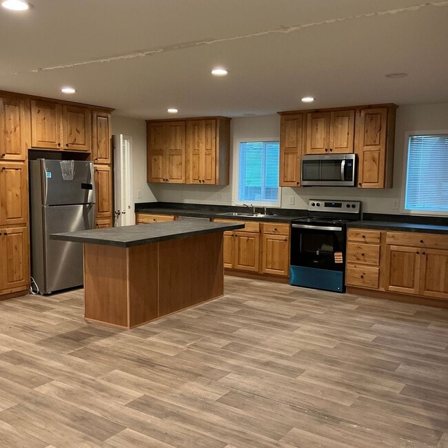 Building Photo - New 3 bdrm 2 bath Manufactured home in Hayden, ID for Rent