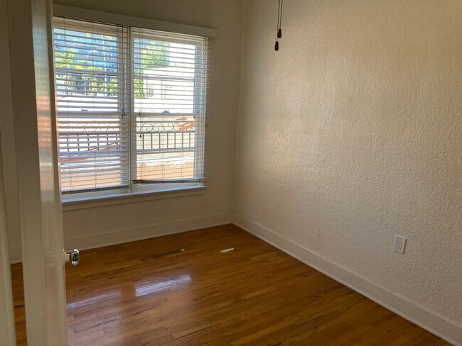 Building Photo - Spanish Garden Style Apartment Community