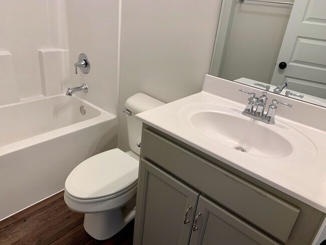 Building Photo - One level home with GARAGE and FENCED BACKYARD!