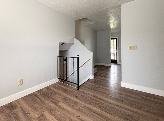 Building Photo - Cozy Home with New Paint & Flooring!
