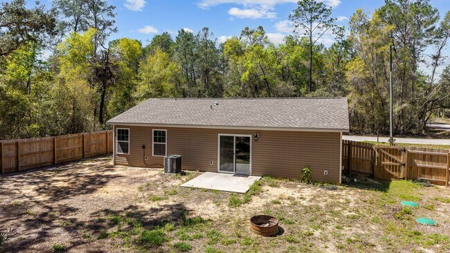Building Photo - *** NOT READY FOR SHOW OR MOVE IN UNTIL AUGUST 1 *** Newer 3/2 in the country with fenced yard an...
