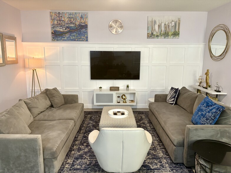 Fully furnished living area with open layout - 1620 Delphi Way