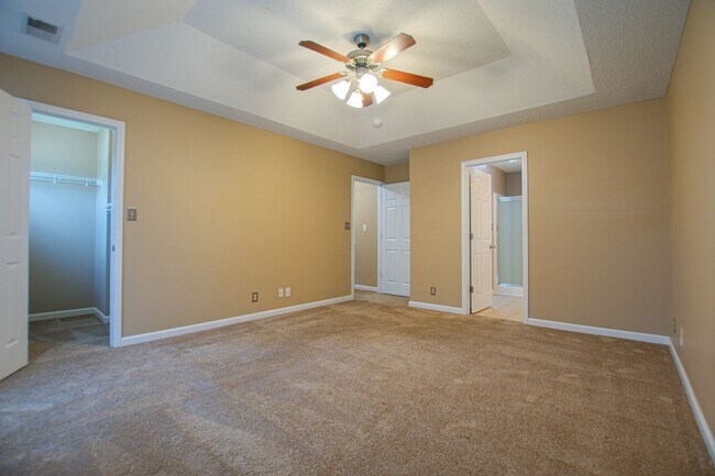 Building Photo - Pet Friendly Three Bedroom with Bonus!