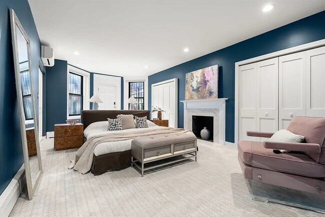 Building Photo - large One bedroom with three sizable closets and full windows facing the private, fenced-in backy...