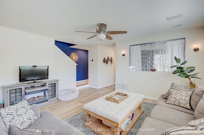Building Photo - Evolve Real Estate: Beautiful Corner Townhome Available for Move-in on July 21st!