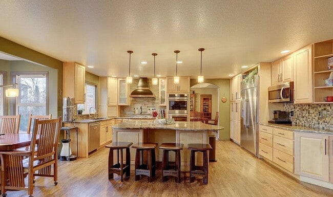 Building Photo - Light-Filled Longmont Gem with Elegant Fin...