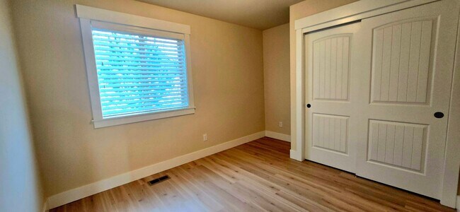 Building Photo - THREE-CAR GARAGE! This charming home offers 3 bedrooms, plus an office/rec room, and 2 bathrooms.