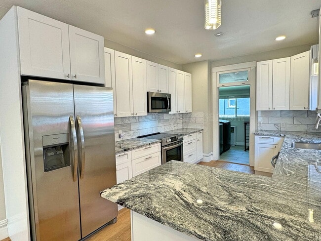 Building Photo - 2849 W 28th Ave