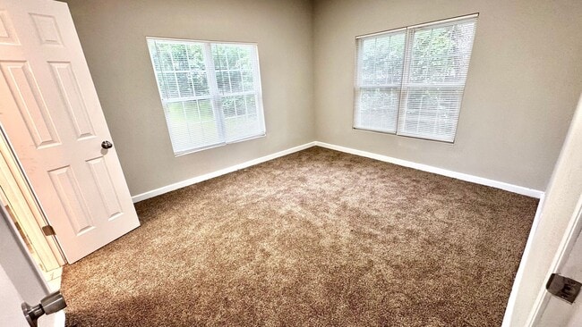 Building Photo - Spacious 3 Bedroom Home with Modern Updates & Shop
