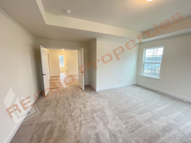 Building Photo - Beautiful 3 Bedroom 2-Car Garage Home w/Lo...