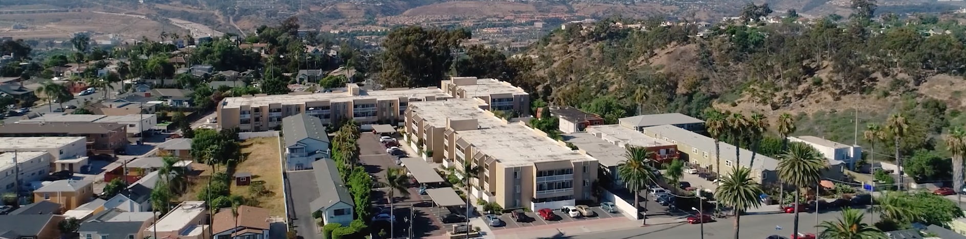 Ariel view of Suncrest Villas- Unit is in the back L building (quiet location - far away from the street) - 3030 Suncrest Dr unit 402
