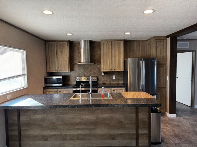 Building Photo - Spacious Four Bedroom Home - Pet Friendly and Horses Allowed!