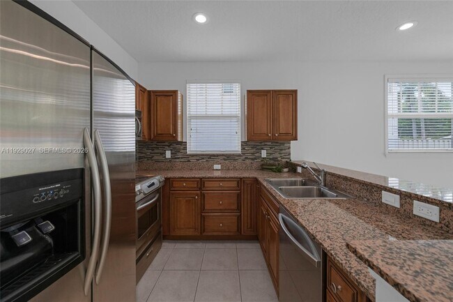 Building Photo - 4088 W Palm Aire Dr