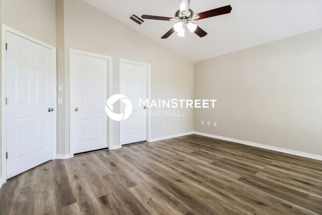 Building Photo - 4 Bedroom Pet-Friendly Home in land o lakes, FL with Main Street Renewal