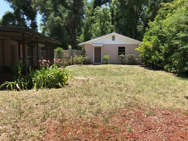 Building Photo - Unique Find! HUGE detached garage/workshop, 3 bedroom, 1 1/2 bath home, screened porch