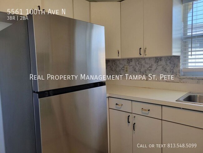 Building Photo - 5561 100th Ave