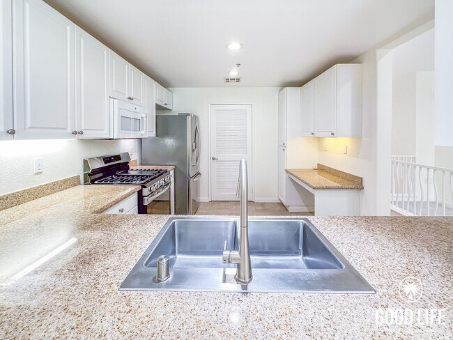 Building Photo - OC: Spacious 2BD/2.5BA Condo in Irvine with Resort-Style Amenities, Private Balcony & In-Unit Lau...