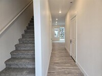 Building Photo - $1000 OFF YOUR 1ST MONTHS RENT! BRAND NEW TOWNHOME IN THE DESIRABLE SOUTHRIDGE AREA!