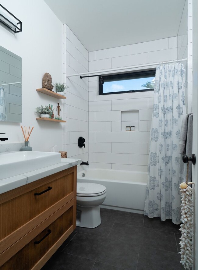 Building Photo - Elevated Haiku Retreat with Ocean Views, Designer Finishes & a Lush Edible Garden Sanctuary