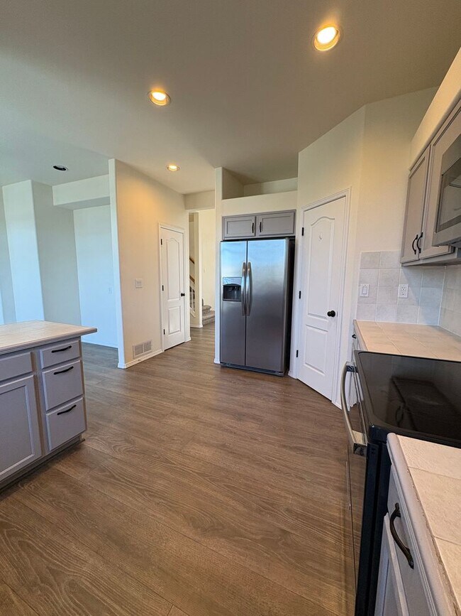 Building Photo - Stunning 2-Story 4 Bedroom Home With Finished Walk-Out Basement and Bonus Room