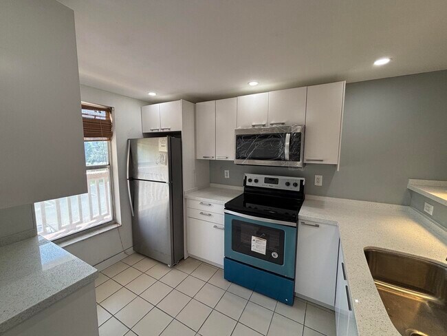 Building Photo - 6051 NW 61st Ave