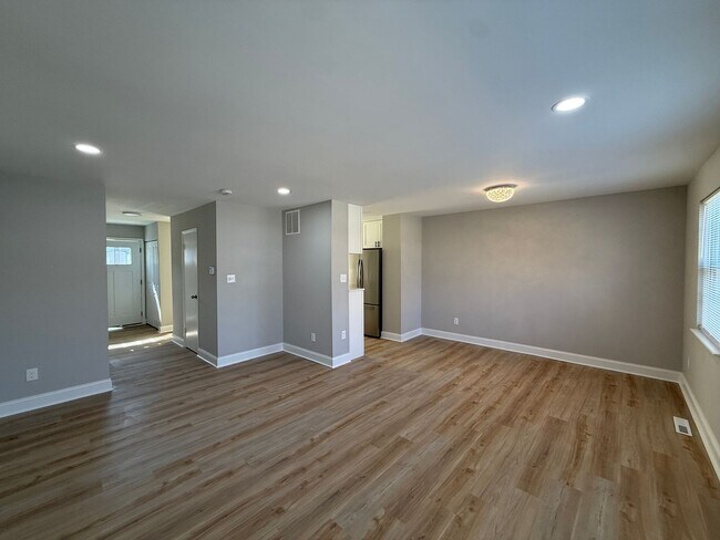 Building Photo - New Everything 4BR Townhome with Private Lower Level Suite | Stainless Kitchen | LVP + New Carpet...