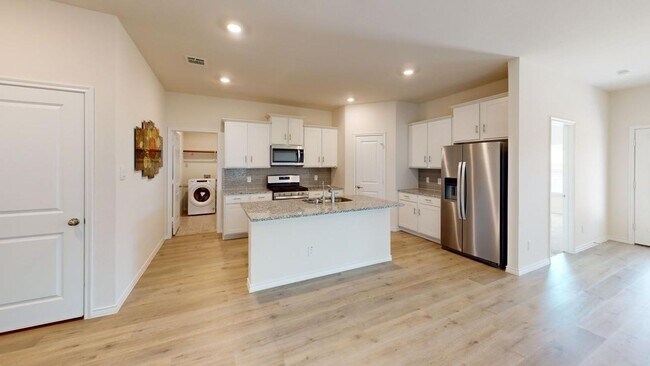 Building Photo - This spacious 2,683 sq. ft. two-story home features 4 bedrooms and 2 bathrooms, offering a well-d...