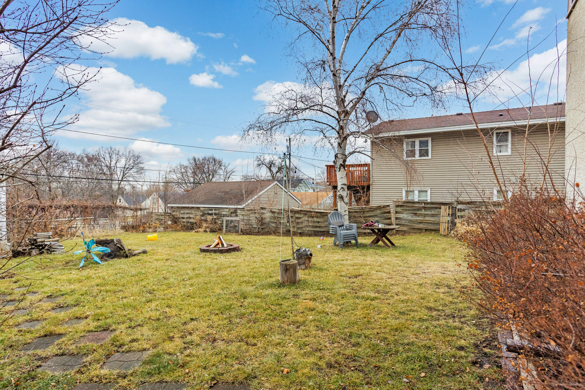 Large 1/4 acre sized yard. Fully fenced in. A rare find in the city! - 616 37th Ave NE