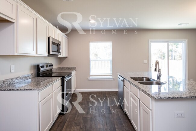 Building Photo - Location, Community, Quality Living. It St...