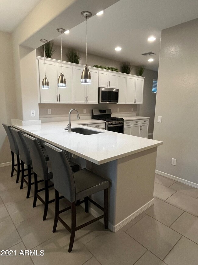 Building Photo - 5410 W Country Garden Ln