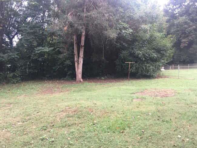 Building Photo - Adorable 2BR Home with Rocking Chair Front...