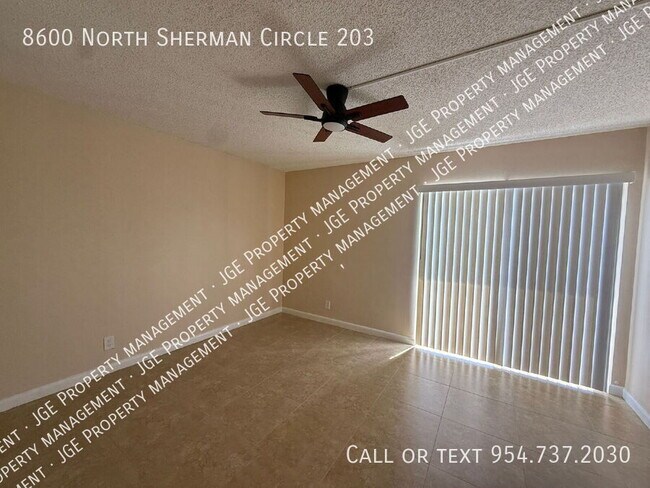 Building Photo - 8600 N Sherman Cir
