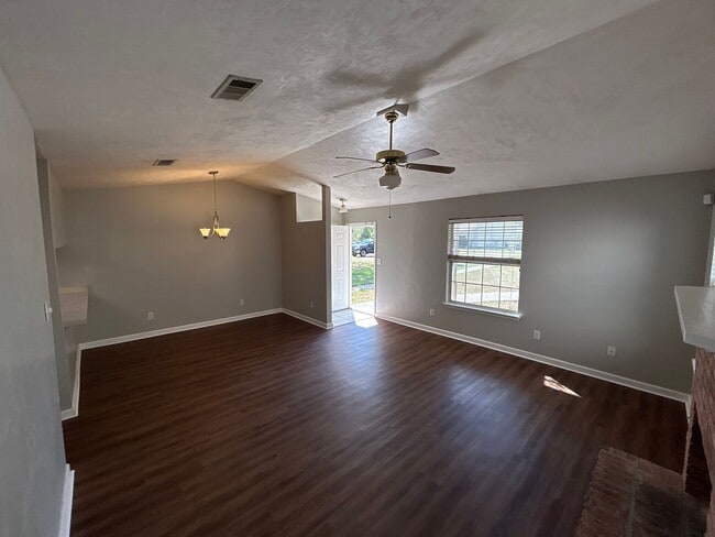 Building Photo - 2BR/2BA Townhome. BRAND NEW FLOORS