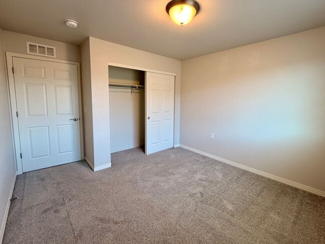 Building Photo - Move-In Ready 3-Story Townhome with Loft & 2-Car Garage