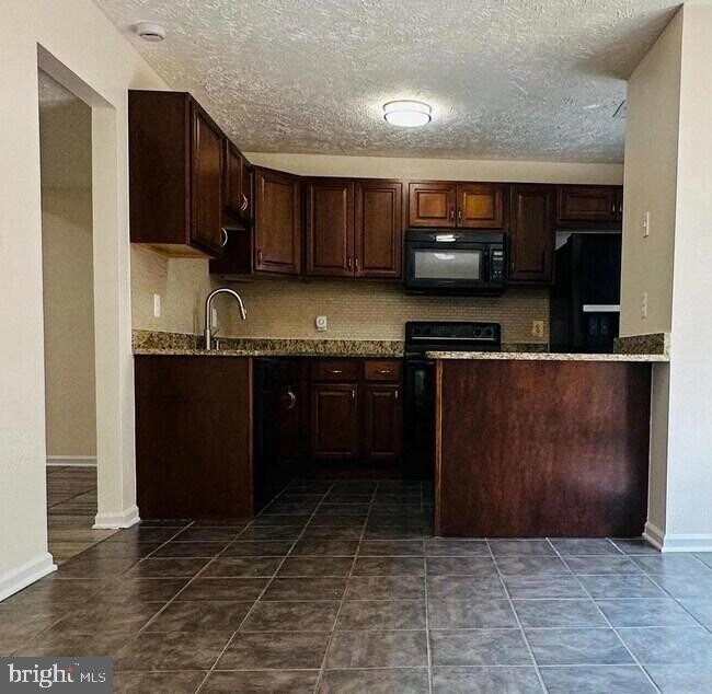 Building Photo - 8658 Woodhue Ct