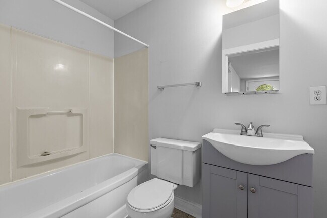 Building Photo - "Charming 1-Bedroom Retreat with Gleaming ...