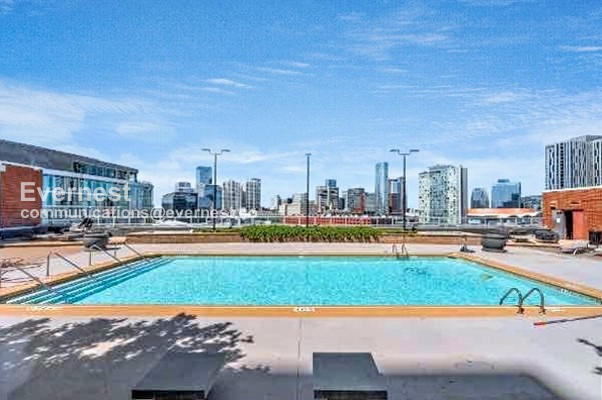 Building Photo - Modern 1-Bedroom Condo with City Views in Prime Nashville Location / Available Now!