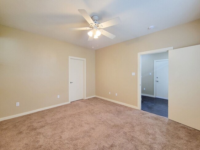 Building Photo - Elegant Gated Townhome Offering Unparallel...