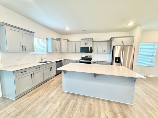 Building Photo - 4 br 2.5 ba home in the Kensington community  READY May 20TH  Close to I-85